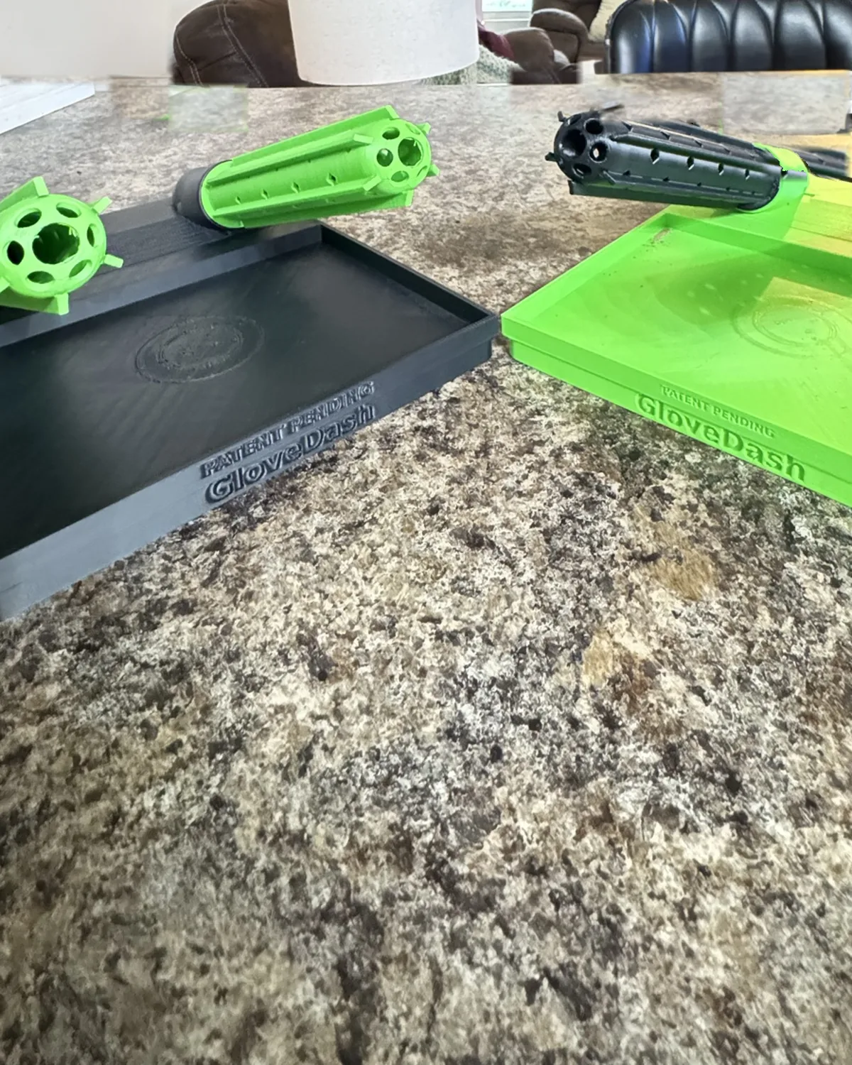 Safety green GloveDash with tubes mounted up front, the black unit sitting beside it